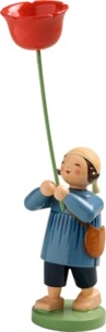 Junge mit Mohnblume