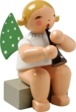 Engel mit Klarinette, sitzend